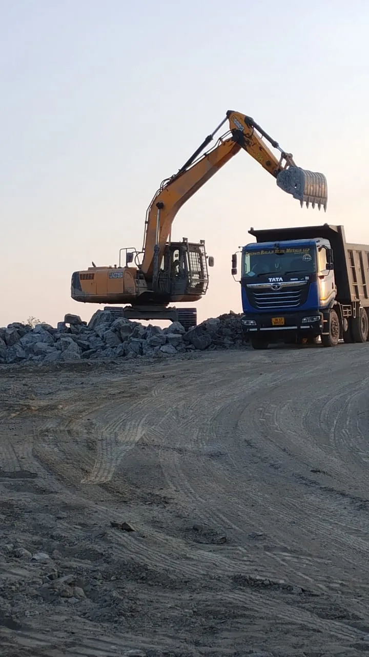 Excavator Loading Tipper Truck